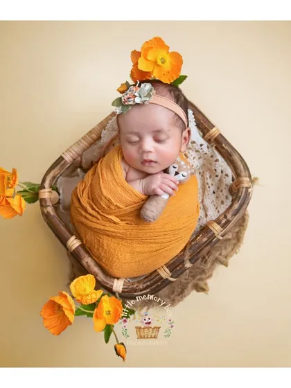 A duplicate of image 16, showing the same beautiful setup. The warm tones and floral elements make this a really eye-catching portrait.