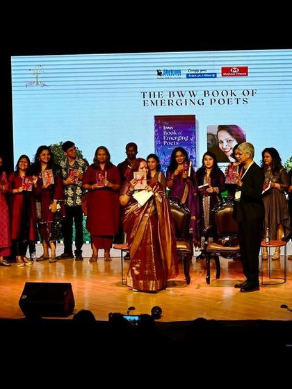 The full stage of our poets at the Bengaluru Poetry Festival, taking a moment to acknowledge the applause and support from the audience. A truly magical moment.