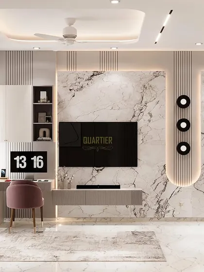 The TV unit and workstation in the Gaur Saundaryam master bedroom render. The design is clean and contemporary, with a marble-look backdrop and ample storage, making it both beautiful and practical.