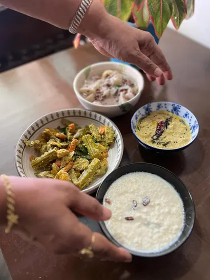 A wholesome spread of some of my classic vegetarian dishes. Here we have a comforting Avial, a sweet and tangy Pineapple Pachadi, a light Olan, and a creamy Payasam. A complete meal in itself.