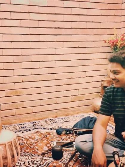 A candid moment of conversation and laughter with Sarfaraaz Khan. Our friendship and musical partnership have grown over many years and countless performances.