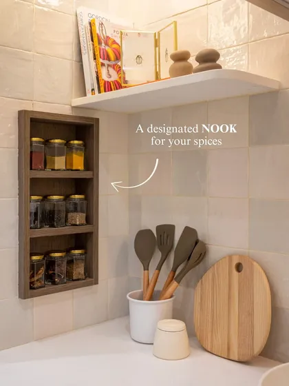 A designated nook for spices keeps them organized and beautifully displayed. It’s one of those small, personal details that makes a kitchen feel truly yours, bringing both function and joy to your cooking routine.