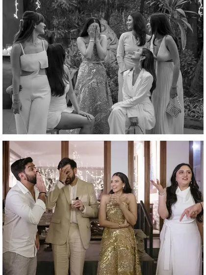 A candid black and white shot of the bride and groom reacting to speeches. Their habit of burying their faces in their hands at cute or embarrassing moments is an adorable detail of their story.