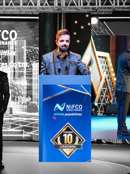 A black and white edit of me at the podium during the NIFCO 10th anniversary.
