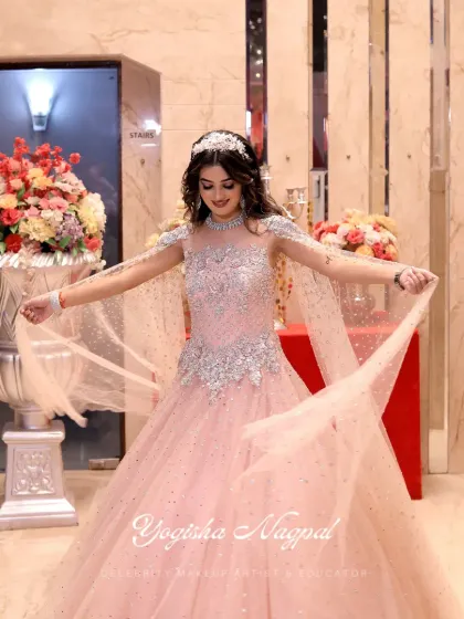 This is the quintessential engagement or cocktail party look. I created a soft, romantic glam with sparkling eyes and a flawless base to match the fairy-tale aesthetic of the gown, ensuring the bride-to-be feels like a princess.