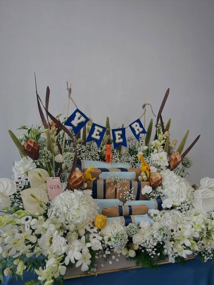 The grand floral and gift hamper for Veer's birthday.