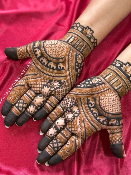 A dark-stained version of the elephant and lotus design.