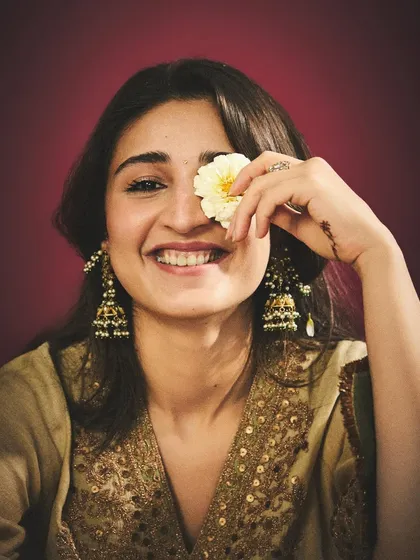 She's a story. A candid, happy moment with Dhvani Bhanushali in a beautifully embroidered Heena Kochhar kurta, showcasing the joy that comes with finding the perfect ethnic outfit.