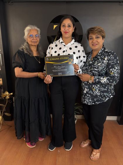 Another happy student receives her certificate after completing our skincare course.