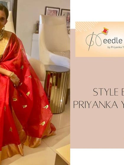 A client looking radiant in a red saree paired with a custom green brocade blouse we stitched for her.