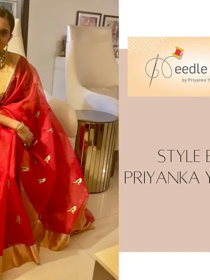 A client looking radiant in a red saree paired with a custom green brocade blouse we stitched for her.