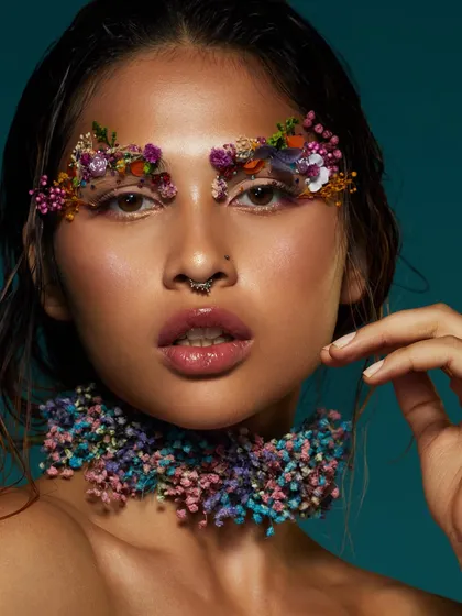 A delicate and beautiful look where pressed flowers are used to create ethereal, artistic eyebrows.