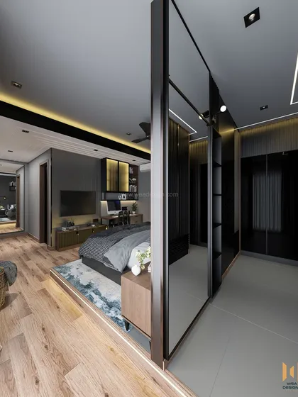 A view showing the sleeping area on a raised platform, with a mirrored wardrobe that enhances the sense of space.