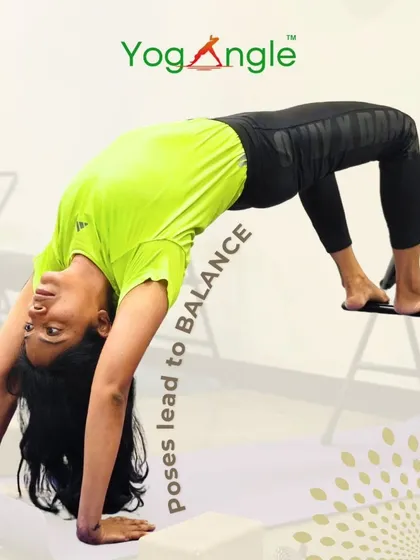 Poses lead to balance, and props lead to better poses. Using a chair for support in this backbend allows for greater opening in the spine and shoulders, helping you find balance with confidence.