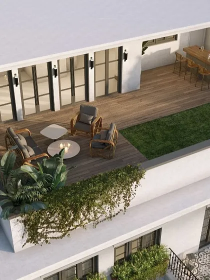 I design outdoor spaces to be true extensions of the home. This rooftop sanctuary was conceived as an urban escape, with a fire pit, comfortable seating, and lush greenery, all designed to make the most of the open sky and create moments that matter.