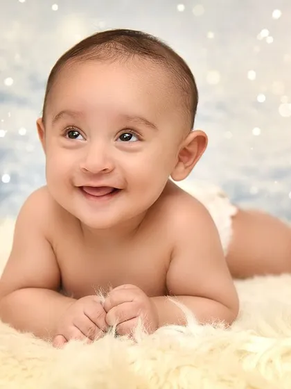 Capturing those precious early milestones is so important. This 4-month session focuses on your baby's bright eyes and happy smiles, using a simple, clean backdrop to keep your little one the star of the show.