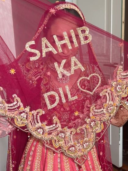 A creative shot with the bride's custom veil. This was a beautiful, personal touch that made her wedding look even more special.