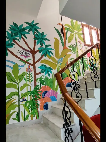 This vibrant tropical mural brings so much life and energy to a staircase. I enjoy playing with bold colors and lush foliage to transform transitional spaces into joyful parts of the home.