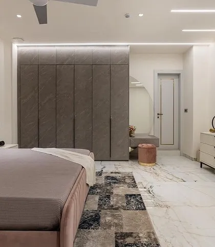 The full bedroom suite, including our custom bed, dresser, and a unique wardrobe with a textured finish, all part of the "Pink Paradise" room.