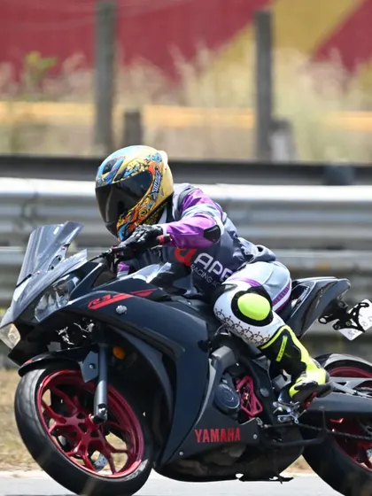 Rider Sonali C carving a corner at the track. We welcome and train riders of all backgrounds, helping everyone find their speed.