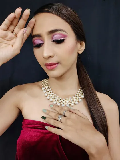 A close-up on the glittery pink eyeshadow. I use high-quality pigments to ensure the sparkle lasts all night without any fallout.