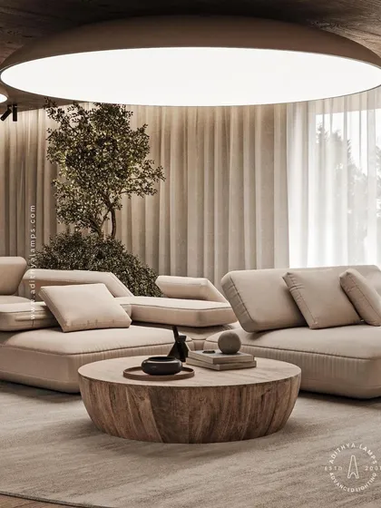 This expansive living room is illuminated by our stretch fabric ceiling light, creating a soft, uniform glow that mimics natural daylight. The fixture provides broad, glare-free illumination, enhancing the room's sense of space and tranquility. It's a perfect example of how lighting can be integrated to feel like a natural part of the architecture.