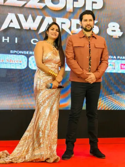 Standing alongside Aftab Shivdasani at the Bizzop Business Awards. My professional presence complements the star power of your celebrity guests.