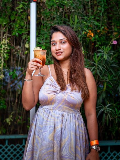 A guest enjoying a cocktail at our Sunday brunch, where memories are made and stories are shared.
