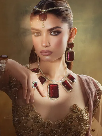A powerful and artistic portrait. The makeup is bold, with a focus on the eyes and a perfectly sculpted face.