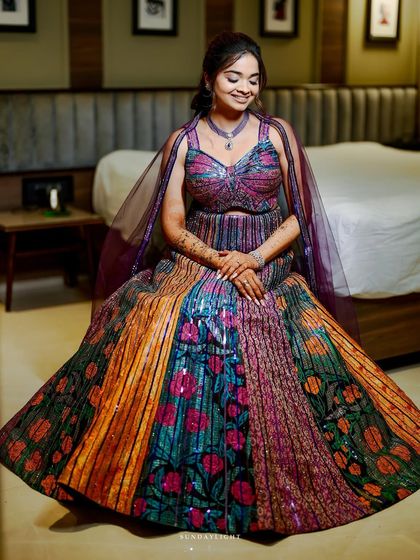 Shloka's happy smile says it all. Her Sangeet look was fun and festive, perfect for a night of dancing and celebration with family and friends.