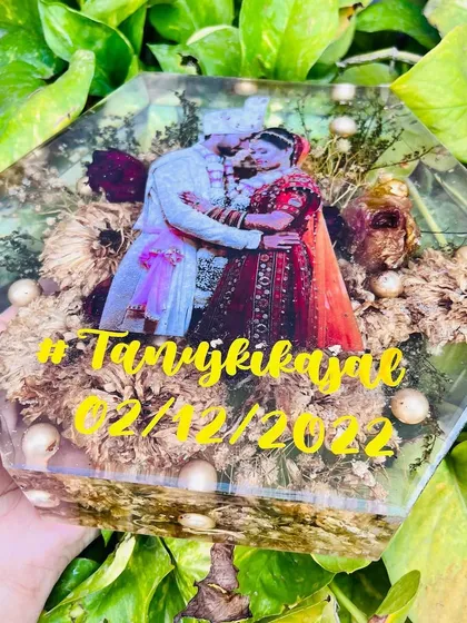This 8-inch hexagon block art is a modern and stylish way to preserve your memories. The geometric shape is unique, and I love adding the couple's wedding hashtag.