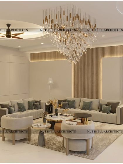 A bright and airy party lounge designed for entertaining. The space is dominated by a magnificent cascading chandelier, with multiple seating arrangements to accommodate guests in comfort and style.