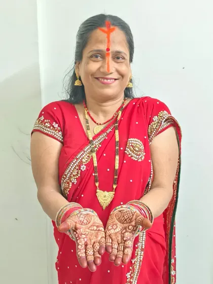 My Maa, the heart of our Chhath Puja, with her hands full of mehndi and heart full of devotion.