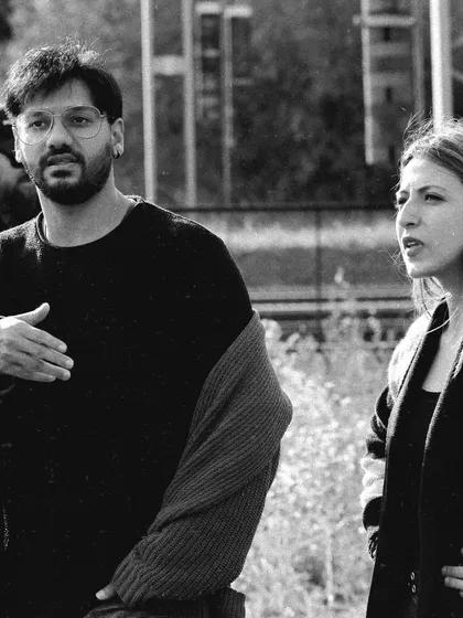 A black and white shot of me in deep conversation with the director, Aditya Datt. These discussions are crucial for aligning the film's visual language and character arcs.