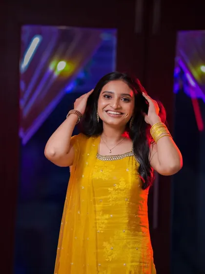 A happy and candid shot of the wedding guest. Her minimal makeup and soft waves hairstyle are perfect for celebrating and taking photos all night long.
