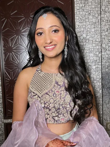 Another angle of this stunning engagement style. The makeup is designed to look flawless from every angle, ensuring she looks perfect in all her photos.