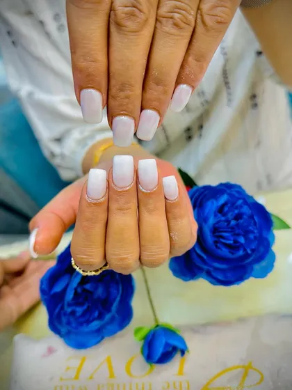 Another beautiful shot of the clean and classic milky white nails.