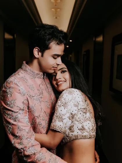 A close-up of the couple, filled with love and happiness. Her makeup is subtle yet defining.