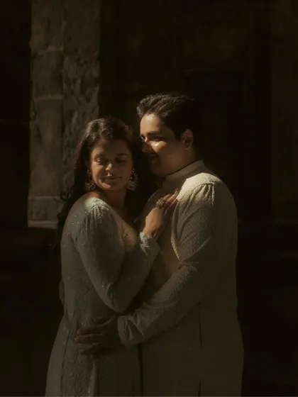 The play of light and shadow adds depth and intimacy. This portrait of Akshay and Bani uses the natural, dramatic lighting of a heritage location to create a soulful and moody pre-wedding photograph.