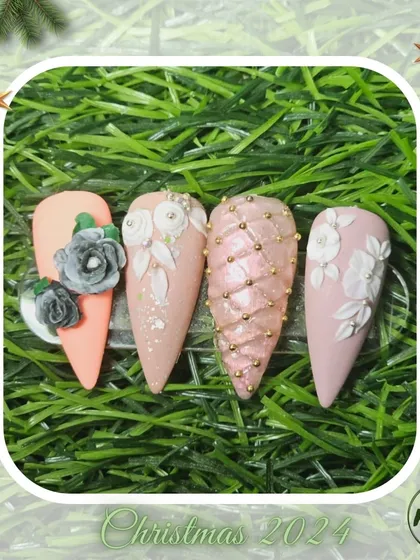 This student's work features beautiful 3D floral designs, showing their ability to sculpt and create dimension.
