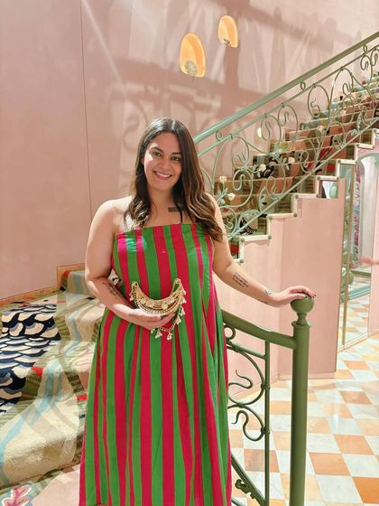 Another shot from the Papa Don't Preach launch, holding a gorgeous minaudière from the brand. I often integrate the brand's products into the event in natural, stylish ways.