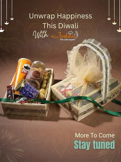 Unwrap happiness with our beautifully curated Diwali hampers. This image displays two distinct hamper styles, one open tray with snacks and treats, and another elegantly wrapped basket, promising more delightful surprises to come.