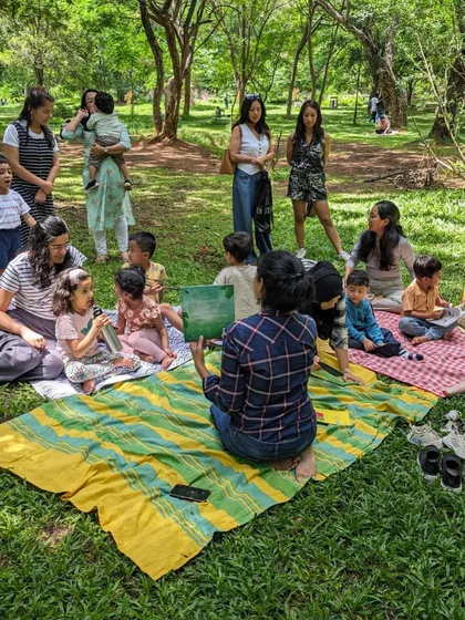 Photos from our 'Environment' week session. You can see the children learning about nature and conservation through engaging stories, right in the heart of nature itself.