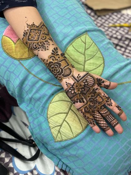 The full view of the geometric fusion design on the arm.