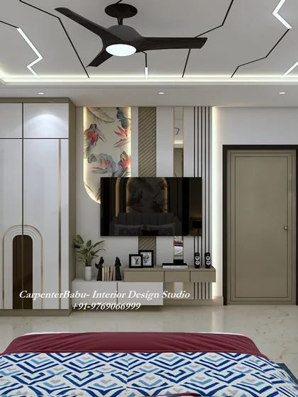The TV unit in this bedroom is simple and elegant, with a floral niche above it. The design is a beautiful blend of modern functionality and artistic detail.