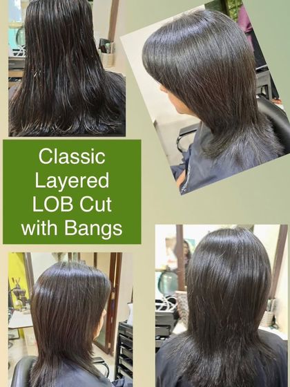 A classic layered lob (long bob) complete with bangs. This is a sophisticated and stylish cut that frames the face beautifully and adds movement to straight hair.