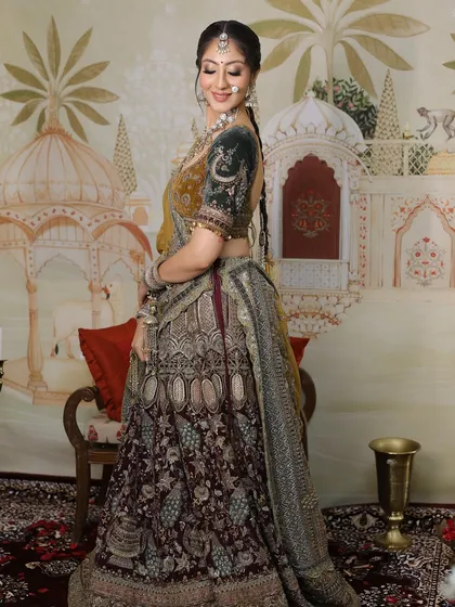 Redefining beauty, one look at a time. This bride looks stunning in her unique lehenga, with makeup that enhances her features.