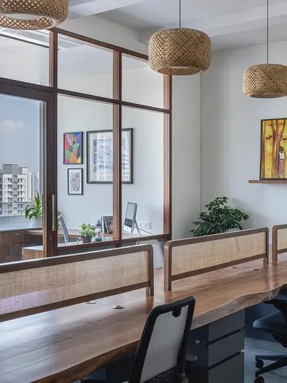 We believe a workspace should be inspiring. For the 'Sepalika' office, we broke away from conventional design, using a live-edge wood community table, cane partitions, and biophilic elements to create a calm, comfortable, and interactive environment that feels more like a living room.