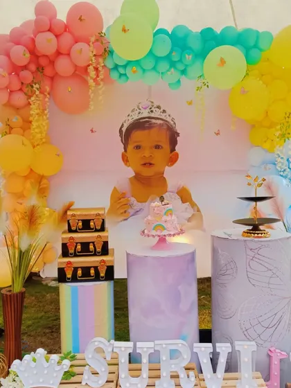 A detailed shot of the personalized setup for Survi's first birthday.