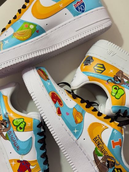 When Bangalore meets Chicago! I made this pair of custom Nike Air Force 1s for a couple's wedding. We included all their favorite things and memories, from food to city landmarks. It's a piece they can cherish forever.